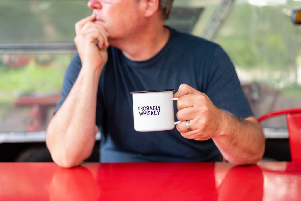 Man with a funny coffee mug