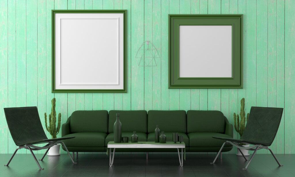 The living room is decorated with chairs, sofaand picture frames.